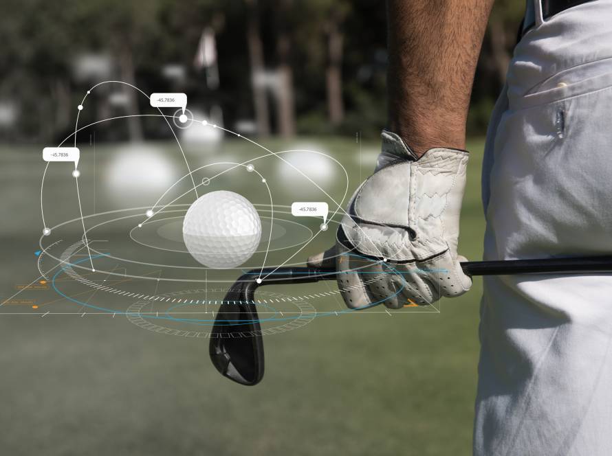 Golfer practicing swing on indoor golf simulator screen in Canada for club fitting preparation and skill development